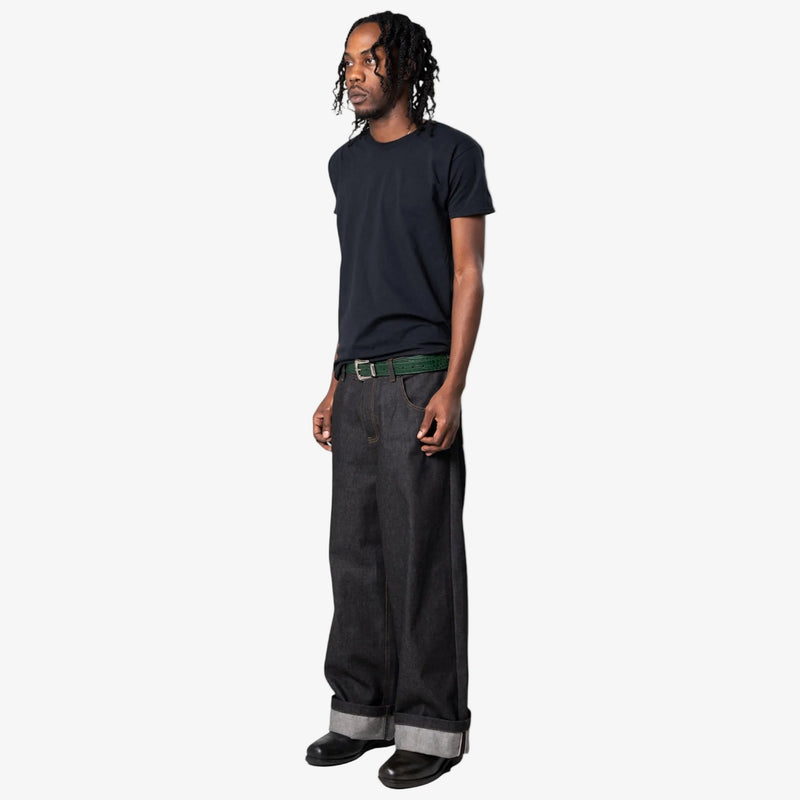 Green croc belt worn with black jeans men's outfit