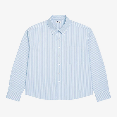 A light blue and white vertically striped long-sleeve button-up shirt with a single chest pocket, laid flat against a light gray background.